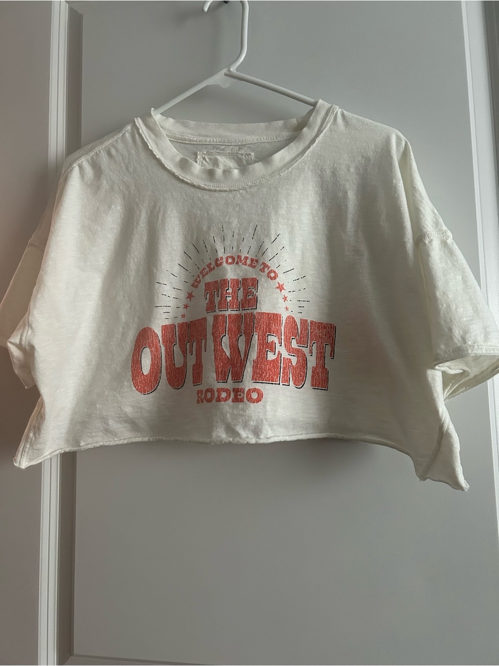 White Crop Tee with Coral 'Out West' Rodeo Graphic